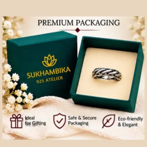 Classic rassa design silver band displayed inside a premium dark green Sukhambika 925 Atelier box, highlighting that it is ideal for gifting, with safe & secure packaging, and an eco-friendly & elegant design.