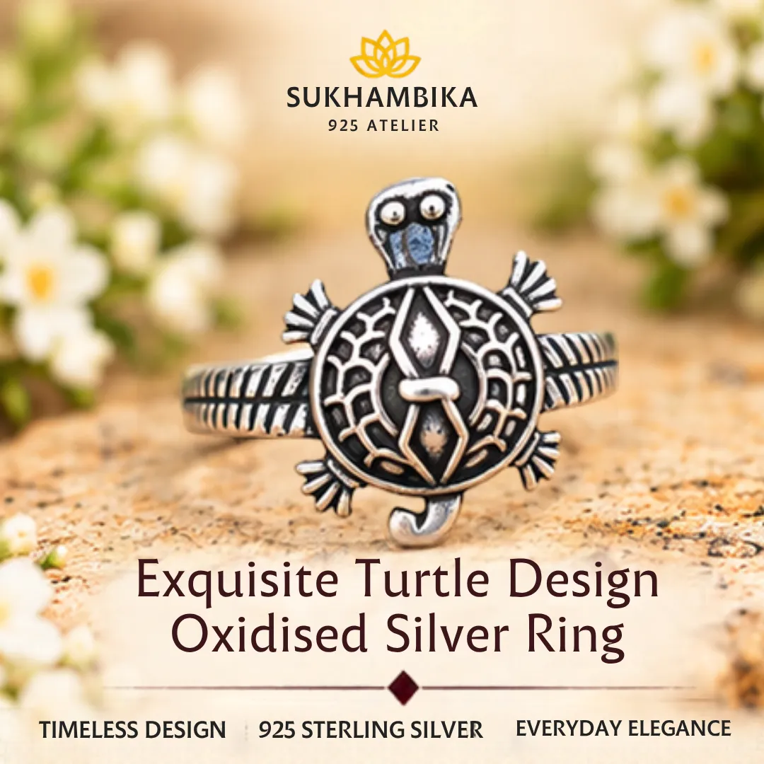 Lucky-Tortoise-Design-Silver-Ring-Sukhambika Promotional product image of an exquisite turtle design oxidized silver ring resting on a textured stone surface, highlighting the 925 sterling silver purity and timeless design.