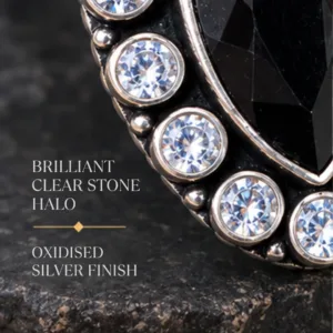 Detailed macro graphic of the black jadau silver ring highlighting the brilliant clear stone halo and oxidised silver finish.
