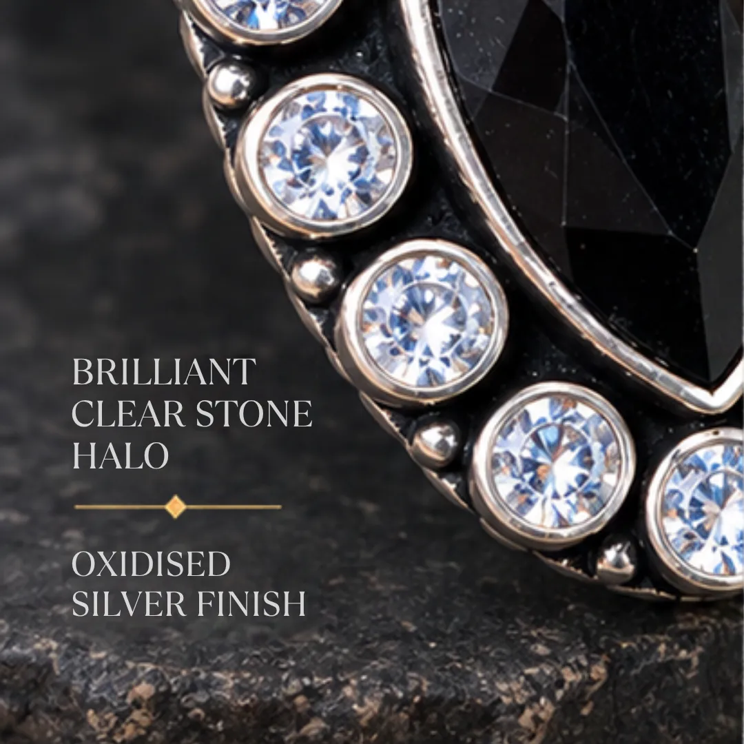 scintillating-center-black-cutstone-jadau-silver-ring-sukhambika (6) Detailed macro graphic of the black jadau silver ring highlighting the brilliant clear stone halo and oxidised silver finish.
