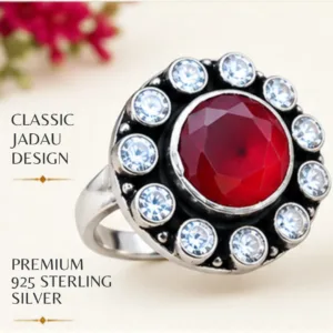 Close-up product image of the ruby jadau silver ring resting on a light surface, highlighting its classic jadau design and premium 925 sterling silver construction.
