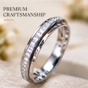 Close-up product image of the scintillating cz stone finished silver band resting on a textured surface, highlighting its premium craftsmanship.
